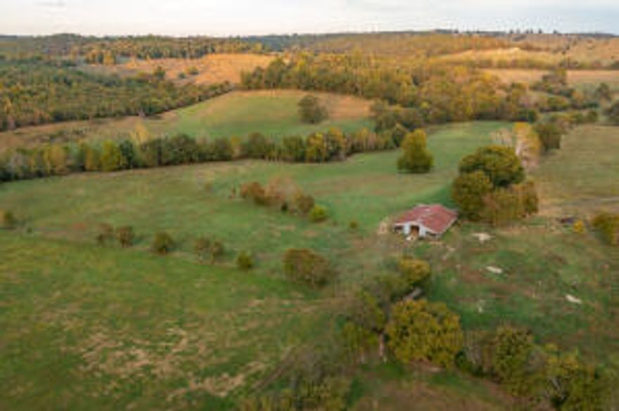 Great Farm in Excellent Location!  Fronts on 3 County Roads, fenced, crossed fenced, barn and several ponds