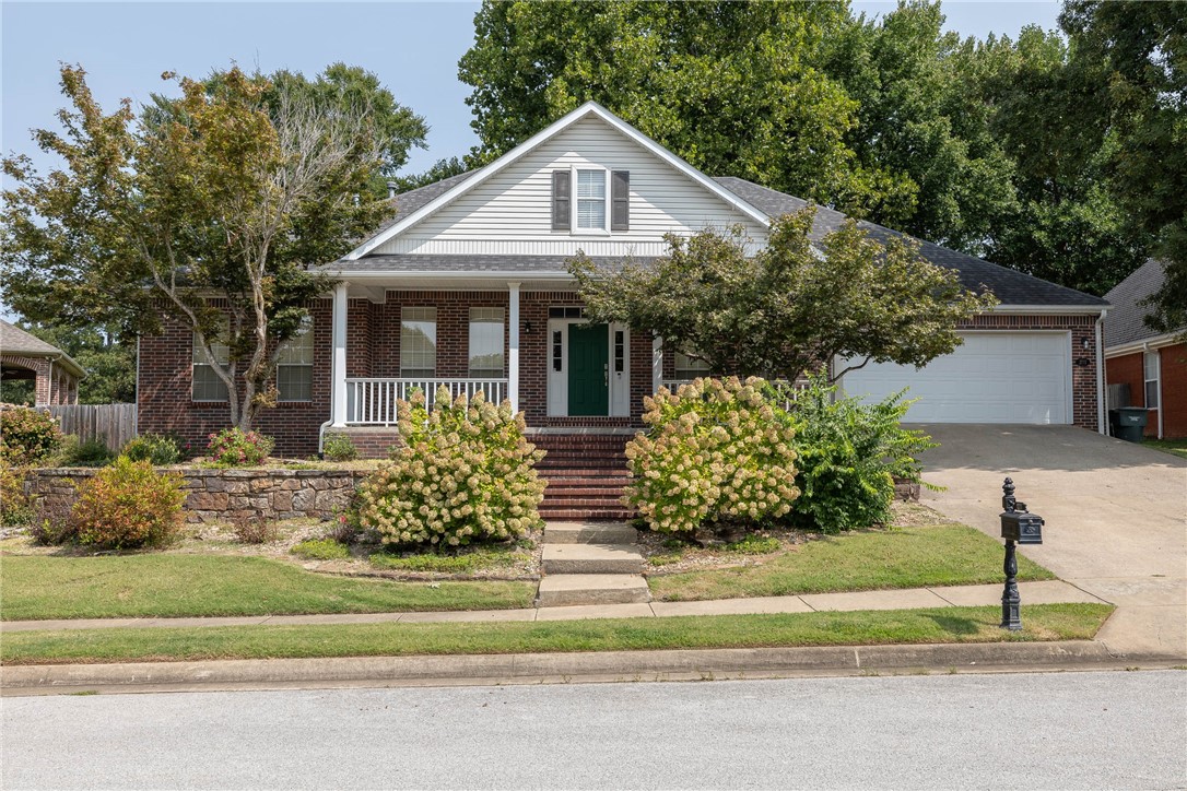 Four bedrooms, three full bathrooms in East Fayetteville that's move-in ready! Most of the square footage is on the main level. Upstairs includes a bonus room and a bedroom with an ensuite bathroom. Large back covered patio and open decking. All appliances included. All bedrooms have nice sized closets. Two living areas on the main level both with fireplaces. Split floorplan. Covered front porch. New interior paint and French drains. Large primary suite. Truly a great floorplan! Located on a cul-de-sac street!