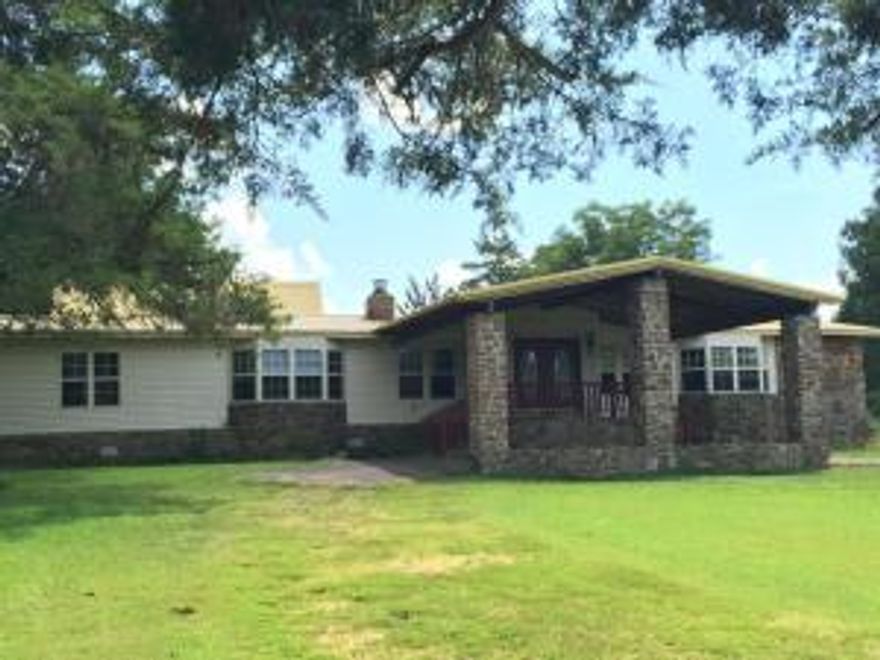 Crow Mountain home on 2+/- acres,  4 bedrooms, 3 full baths, 2 kitchen and living areas. Don't miss sun room, office, and sauna!! Also, included is the shop building for any additional storage or the hobbyist! With a little TLC this home has a lot of potential!! Selling AS-IS and priced accordingly!! SQFT per tax records.