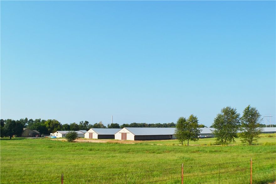 5 house farm on 17+ acres with 2196 sq ft 3 bedroom 2 bath home. (3) 40 x 400 and (2) 43 x 500 Houses are completely updated with new equipment. Several outbuildings including garage with shop and stacking shed. New large propane tank recently installed to cut heating expense. This is a money maker..