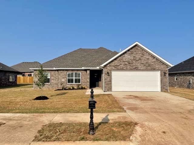Newer Construction 4 bed 2 bath home located directly behind the new Pea Ridge High School and only minutes from Bentonville! Features include custom cabinets, large kitchen island, upgraded 3cm granite & fixtures, gas range, wood look ceramic tile floors, custom tile shower, whirlpool tub, raised ceilings, 2'' faux blinds, covered patio, & much more! ***Pictures may not be of exact unit available, paint colors, flooring color & style and cabinets may vary.***