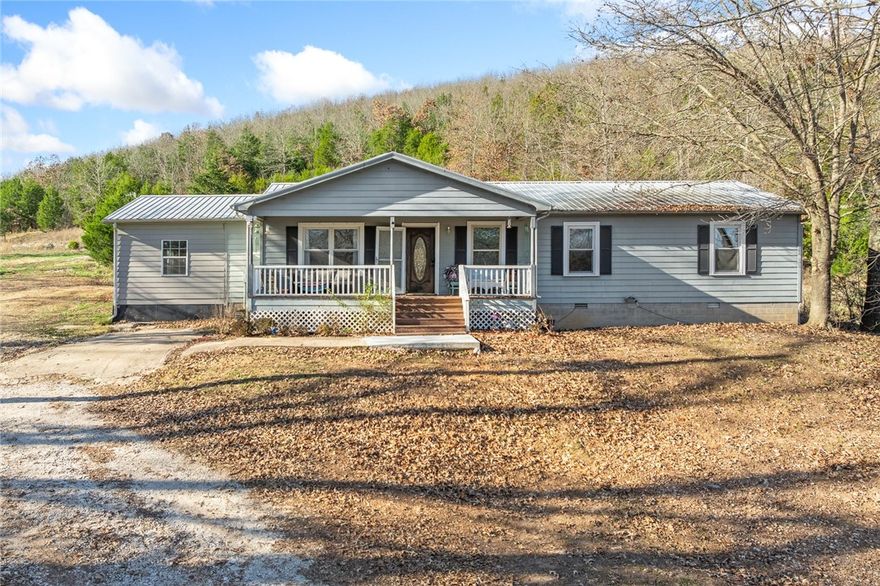 If you're looking for privacy and room to spread out, this place checks every box. Set on just under 40 wooded acres, this comfortable four or five bedroom home sits at the top of the hill with long views and no neighbors in sight. Inside you’ll find a practical layout with two additional flex rooms that work well for an office, hobby space, or extra storage.

The land is mostly wooded with plenty of wildlife and space to explore, whether you enjoy hunting or just want the peace that comes with being surrounded by nature. It’s quiet, private, and still only about ten minutes from Harrison and an easy drive to Branson.

A solid home, acreage in the beautiful Ozarks, and a location that keeps you close to town while feeling a world away. Come take a look.