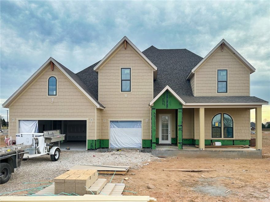 Welcome to County Line Square, a new Springdale community near Shaw Family Park with a pool and pavilion for residents. The entry opens to a bedroom and full bathroom on the right, then continues through an arched opening into the main living area. A fireplace anchors the space, while 4 large windows overlook the covered back patio and engineered hardwood floors extend throughout the first floor. The kitchen features include a large island, 3CM granite countertops, cabinets to the ceiling, GE Profile stainless steel appliances, and a pantry. The primary suite is also on the main level and includes a vaulted ceiling, a bathroom with a double vanity and centered makeup vanity, a walk-in shower, and a walk-in closet. Also on the first floor are a laundry room and mudroom with access to the 3-car garage. Upstairs offers 3 bedrooms and a full bathroom. A fence, gutters, and blinds are included. Builder’s preferred lender is offering $3500 toward closing costs or a rate buy down. *Agent Owned*
