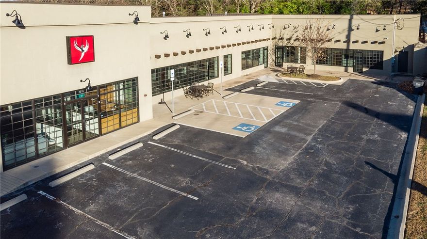 BACK ON THE MARKET DUE TO INDECISIVE BUYER.
Masterfully restored 1-Level building with striking finishes, high ceilings and an incredible amount of natural light. Located in the heart of Fayetteville with desirable College Ave frontage and accessibility, this property is a showcase for a national or regional headquarter company. Large glass walled conference room. Spacious reception area with functional built in storage and workspace. 12 private offices with 7 spaces for support staff. 4 handicapped accessible bathrooms. Executive office space with private reception and adjoining office for support person. 20 parking spaces. Building can be divided into two functional office spaces. Dropped Metalworks tin ceiling tiles and custom LED drop lights. Motion sensor light switches in offices. Centrally wired speaker system. Cat 6 cable throughout. Multiple HVAC zones.
Please visit the 3D Virtual Tour.