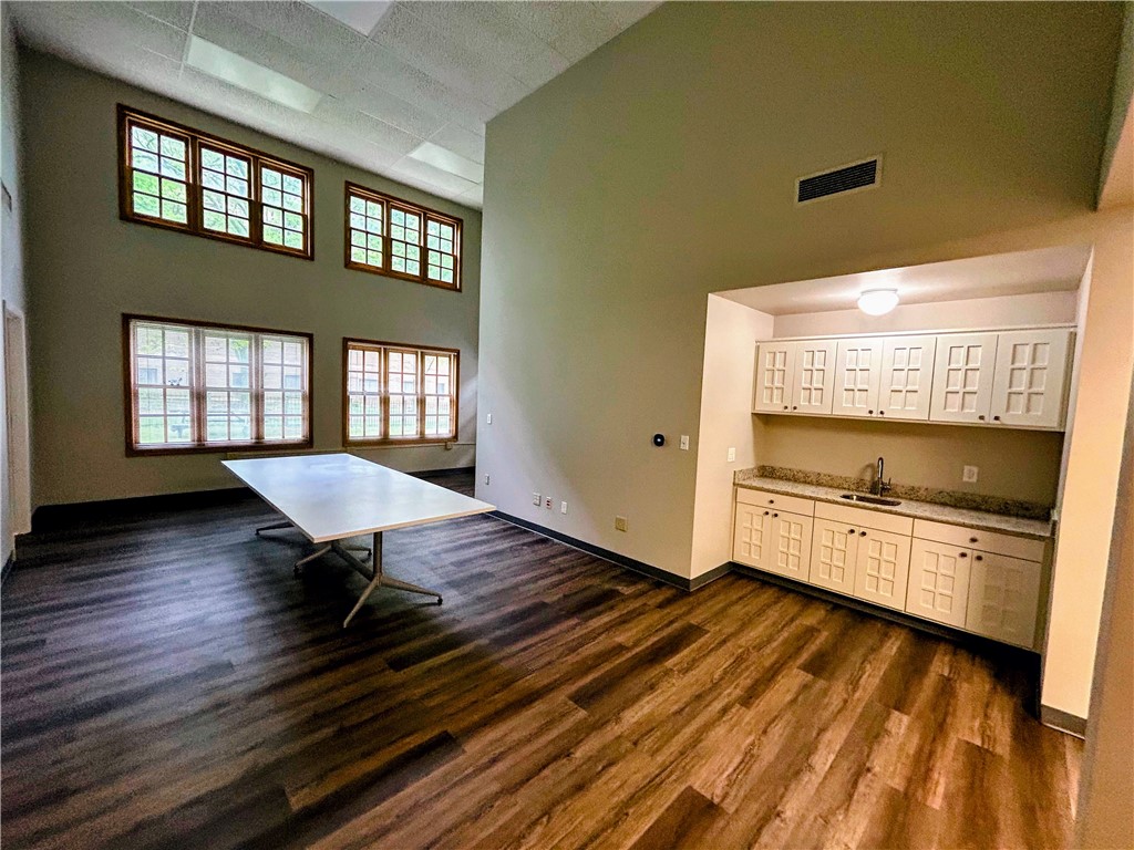 A recently updated 3 office suite is now available at the Maple Corner Office Building. Ideally situated next to the hospital and just a short walk from the newly revitalized downtown area. This beautiful space has 3 spacious private offices, a main conference room/lobby area with vaulted ceilings, a coffee bar with sink, and a large storage closet. This space features: prime location, abundant natural light, high-speed internet access, ample parking, 24/7 security, and a shared lobby area and kitchen. Utilities and Maintenance Included (Tenant responsible for internet). $1,800 per month with a $1,800 deposit. 12-month minimum lease.
Don’t miss this opportunity! Contact us today to schedule a viewing and secure your lease. Agent Owned.