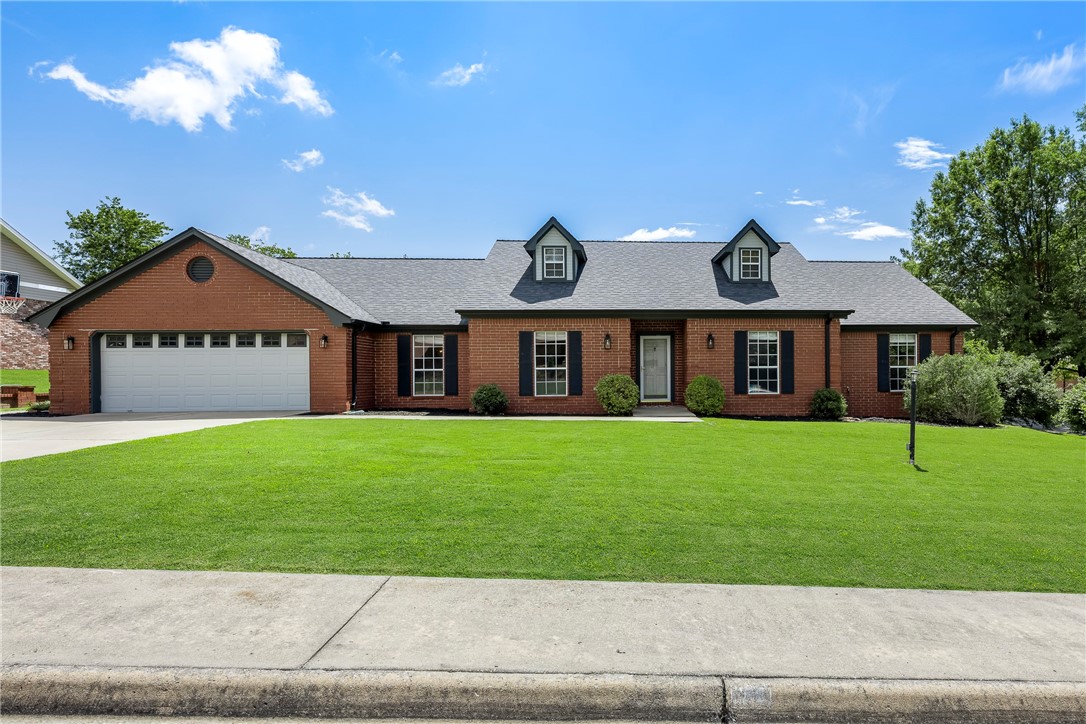 You just can't find a more central location than this! Convenient to the Razorback Greenway, Lake Fayetteville, shopping, dining and so much more! Welcome to this gorgeous home at 205 Michelle. Imagine enjoying this cheery living room overlooking your spacious yard (new fence and landscaping in 2022) or relax in one of the 4 spacious bedrooms! You will appreciate the solid hardwood flooring, fresh paint, granite counters and a fantastic layout offering 2 living rooms and a formal dining room with lots of space and storage everywhere! The expansive yard and patio/fire pit area offers a backdrop for memories you'll build for years to come. You won't need to worry about a thing in your new home, with new architectural shingle roof, hvac, water heater, gutters and privacy fencing all in the last 4 years. Just move right in and enjoy this beautiful, well kept home in a quiet, friendly neighborhood. Don't wait, this one is special!