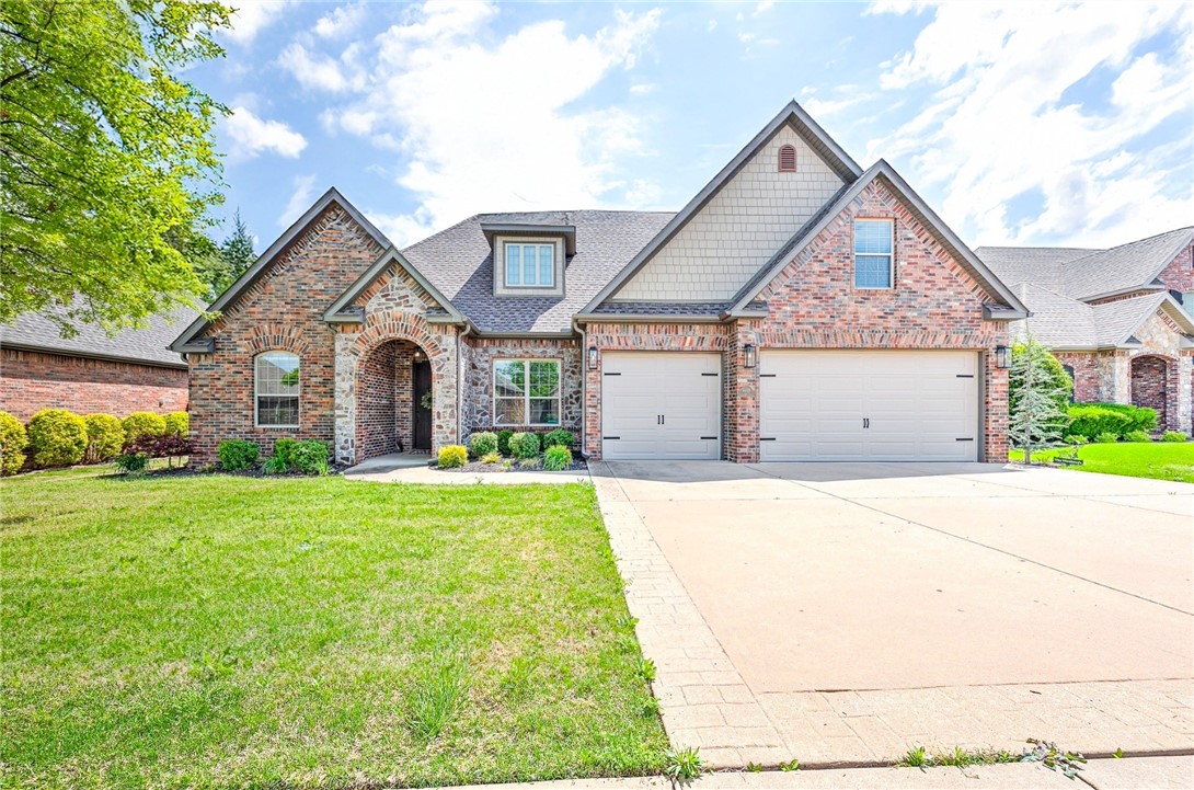 Stunning move-in ready 6-Bedroom, 3.5-Bath Home in Creekwood ā back on the market due to no fault of the sellers or home. Features open concept flow with flexible living spaces: With six spacious bedrooms + a bonus room/office option, there's ample room to grow, work, or entertain. Gorgeous gourmet kitchen with an oversized island, granite counters, double ovens & gas cooktop. Private backyard oasis: custom paver walkway leads to a private fire pit with built-in seating, complemented by a covered patio.
Exceptional community amenities: Creekwood offers a scenic pond, playground, sparkling pool with pool house, and miles of walking/ biking trails along the Razorback Greenway, all just steps away. Prime location: Convenient to shopping, schools, trails, pickleball, entertainment, and everything Northwest Arkansas has to offer.