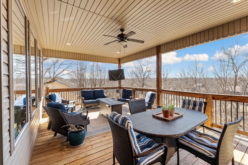 Custom home was designed with breathtaking lake views in mind. From the moment you step through the front door, you’ll appreciate the craftsmanship & thoughtful design that maximizes the stunning scenery in a private cove. The open floor plan features crown molding, 9' ceilings, hardwood floors, granite countertops, and abundant storage. The chef-inspired kitchen is perfect for entertaining, offering a large prep island w/ sink, bar seating, ss appliances, 2 pantries, gas range, built-in wall oven, and convection microwave. The split floor plan has 2 bedrooms & 2 baths upstairs. The main floor includes the primary suite with lake access, a luxurious ensuite with a tiled walk-in shower, soaker tub, and dual vanities. The lower level offers a second living area, dining space, bedroom, full bath, media room with wet bar & a 500 sq ft craft/hobby room (not included in sq ft), plus a patio to enjoy the view. Perfect for lakefront living in a fantastic neighborhood! Extra lot available for purchase for added privacy.