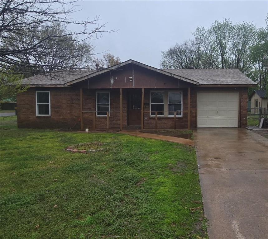 Investor Alert! Brick home sits on a corner lot with mature shade trees in the front yard and fenced backyard. 3BD/1.5BA, separate laundry room and 1-car garage. Perfect value-add opportunity! Established neighborhood. Strong rental potential. 2 Miles from Downtown Rogers. Sold-as-is.