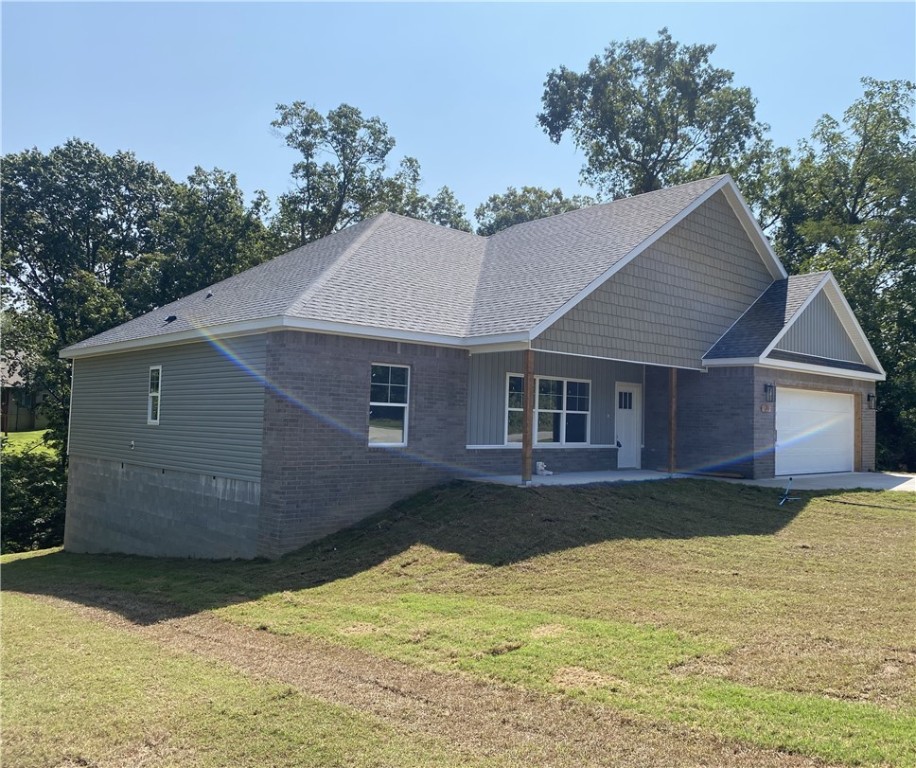 This 3 Bed/2 Bath home features an open layout, kitchen island, granite countertops, stainless steel appliances, and a large pantry. Large back deck will be great for hosting, morning coffee, and to sit, relax, and enjoy the wildlife. Home is minutes away The home is minutes away from Loch Lomond, I-49, and not too far from Bach 40 hiking and biking trails. Home comes with a 1-year Builders Warranty. Under Construction - completion date of October 7th.