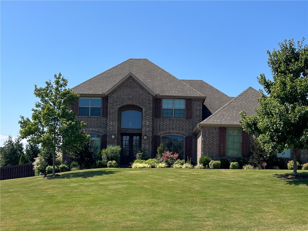 Fayetteville's sought after gated subdivision - Waterford Estates! This beautiful home on a large .77 acre lot has it all with extensive backyard landscaping with many trees that creates abundant privacy and beauty year round. A true must see! Neighborhood features awesome community amenities including clubhouse, pool, field, trail to white river and fishing ponds. Primary bedroom suite, powder room, study on the main level with 3 bedrooms, 2 bathrooms plus a bonus room on the 2nd level. Lots of storage, large closets, etc... The primary suite features a large bathroom, two closets, large walk-in shower and a large soaking tub. Back covered deck and concrete patio perfect for enjoying sunsets and your own private oasis. Full yard irrigation system, new water heater.