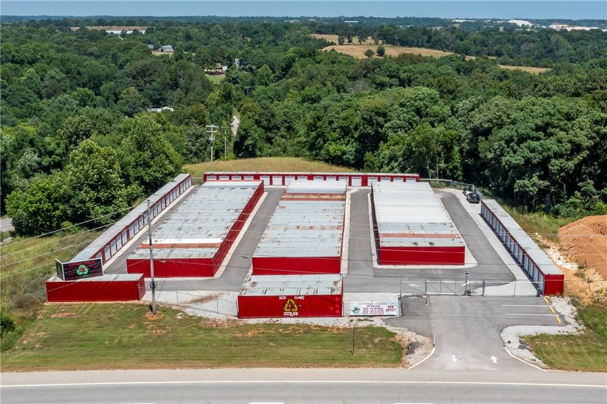 Check out this Money Maker!!  Time to own your very own Mini Storage that has a great return on the dollar!  The beginning cap rate is great then it gets even better after 5 years on the internal rate of return on your dollar after 5 years!  Local financing is available, this complex has 161 units, and full or almost full with competitive rates and better rates compared to other storage facilities.  The location is ideal, right across from a school & right on the 412 E highway with 20K plus people going by it daily!  It's gated and has a security gate to get in with auto payment if desired.  Easy to use storage facility computer software that you the buyer can sign up for, this is what the current owner is using.  Don't miss out on this wonderful, opening opportunity to get into the storage facility ownership!  NWA is growing and everyone has "Stuff" that they need to put somewhere, don't miss this opportunity.