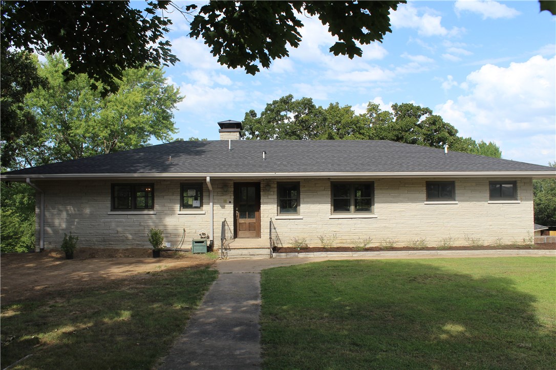 Do Not Miss This Newly Remodeled House on .75 acre in the heart of Prairie Grove. Everything has been updated and is brand new. This beautiful home includes 5 beds, 2 1/2 baths, 2 fireplaces, 2 living rooms, mud room and more. Kitchen is open to the living room with granite counter tops and large island. All upstairs bedrooms have cedar closets. Master bath has custom tile shower and vessel lavatory sink. Also includes landscaping in front and back.