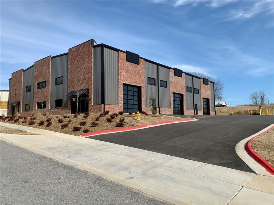 Beautiful, brand new building offering 9300 sq ft of flex space in north Fayetteville. Fantastic location with easy access to I49 & 71B. Street frontage with "office" access. Features 3 12'x12' bay doors, two with drive-in capabilities. 3 phase electric. Slab has not been poured but this allows buyer to finish building to his/her specs. Buyer could potentially add second story to allow increased square footage & usable space. C of O was delivered in December 2020. Don't miss out on this rare opportunity to purchase new warehouse/flex space in Fayetteville!