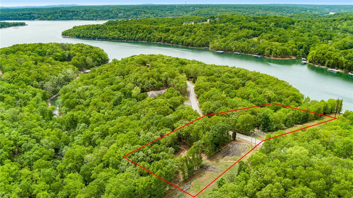 Beautiful lake front property situated on both sides of Coose Hollow Lane. Build your dream home and embrace lake living at its finest. Enjoy all historic downtown Rogers has to offer located only 20 minutes away, offering privacy with convenience to town. Don't miss the opportunity to build a lakefront home while living in close proximity to all of the amenities of Northwest Arkansas.