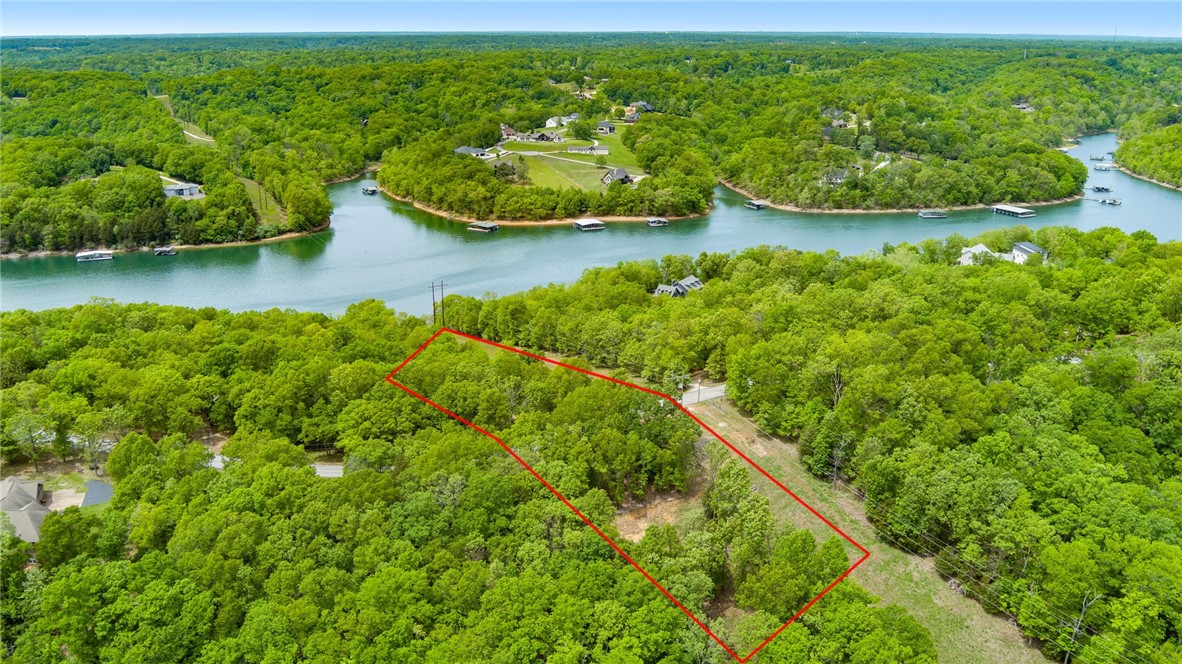 Beautiful lake front property situated on both sides of Coose Hollow Lane. Build your dream home and embrace lake living at its finest. Enjoy all historic downtown Rogers has to offer located only 20 minutes away, offering privacy with convenience to town. Don't miss the opportunity to build a lakefront home while living in close proximity to all of the amenities of Northwest Arkansas.