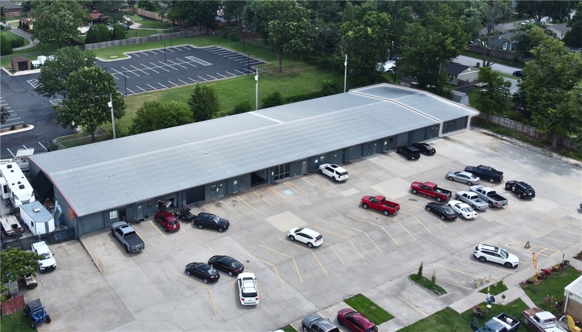 The available space is 1,760 SF. The asking rent is $12.00 PSF, NNN. There is one bay level door measuring 10 x 10. The property is a ready-to-lease flex unit complete with one small office and one half bath. It is located two miles from Interstate 49. The site offers easy access to major highways and nearby amenities.