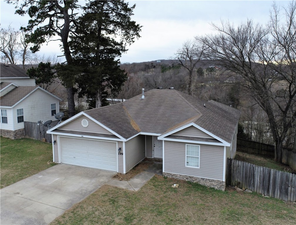 This cute 3/2 is located in a nice neighborhood right in the heart of Huntsville AR, the Crossroads of the Ozarks. It is minutes from the best restaurants and shopping in Huntsville and Downtown. Be in Fayetteville in 35-40 mins. Also located close to Withrow Springs State Park, the Buffalo and the King's Rivers and a short drive to Eureka Springs up Highway 23. The home is in good shape and , has a 2 car garage and back porch to enjoy the views and gorgeous sunsets! Don't hesitate or it will be gone.