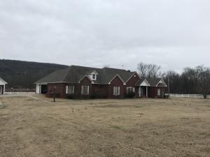 One of a kind home features 4 bedroom 3 .5 bath 2 living areas with open floor plan. Home has pool with pool house , detached brick shop with 25x30 metal building. Property has pond ,creek and beautiful view of mountains. A must see!