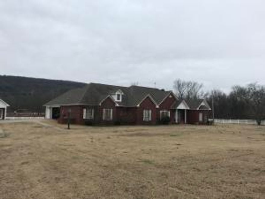 One of a kind home features 4 bedroom 3 .5 bath 2 living areas with open floor plan. Home has pool with pool house , detached brick shop with 25x30 metal building. Property has pond ,creek and beautiful view of mountains. A must see!