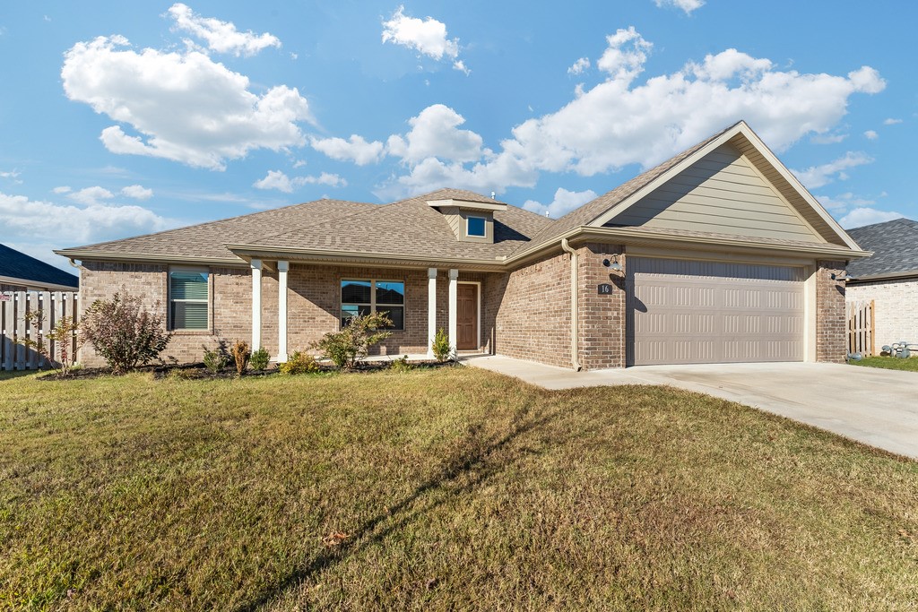 Qualifying buyers can take advantage of up to $3,250 in lender credit by using our preferred lender! Welcome home to Cedar Crest, an affordable, family friendly neighborhood with upsclae amenities including a resort sytle communiy pool, pavilion and playground! Upon arrival you this home welcomes you with its inviting front porch and curb appeal. Inside you're greeted with a large open open-concept living, a dream kitchen with large ilsand, custom cabinetry, granite countertops, and stainless appliances. The bedrooms offer closet space ideally set up for kid's rooms and/or office space with shared full bathroom. The master bedroom is spacious and boasts a large walk-in closet. And you'll absolutely love the location within walking distance to Jerry Pop Elementary and convenient to U of A and all Farmington and West Fayetteville have to offer!