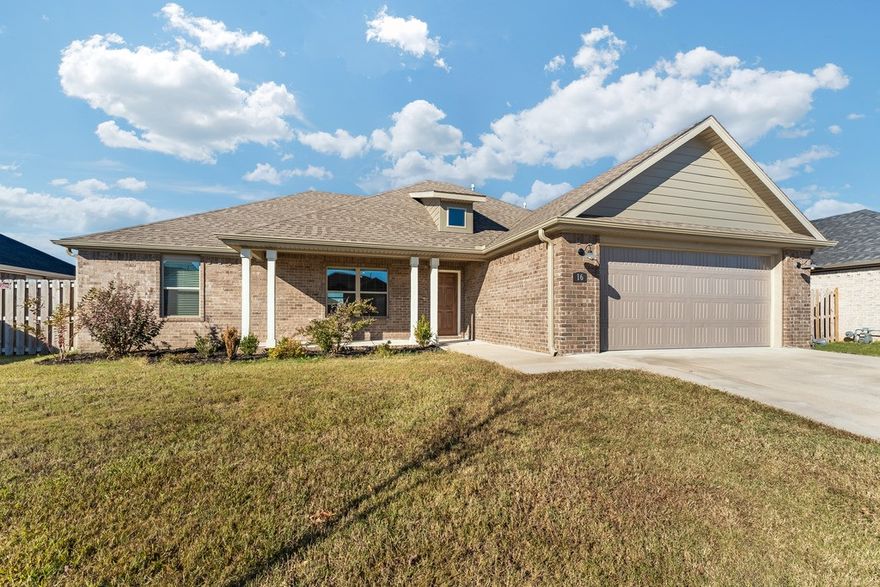 Qualifying buyers can take advantage of up to $3,250 in lender credit by using our preferred lender! Welcome home to Cedar Crest, an affordable, family friendly neighborhood with upsclae amenities including a resort sytle communiy pool, pavilion and playground! Upon arrival you this home welcomes you with its inviting front porch and curb appeal. Inside you're greeted with a large open open-concept living, a dream kitchen with large ilsand, custom cabinetry, granite countertops, and stainless appliances.  The bedrooms offer closet space ideally set up for kid's rooms and/or office space with shared full bathroom. The master bedroom is spacious and boasts a large walk-in closet. And you'll absolutely love the location within walking distance to Jerry Pop Elementary and convenient to U of A and all Farmington and West Fayetteville have to offer!