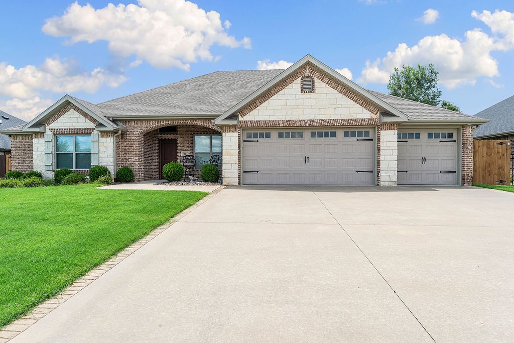 Discover this stunning all-brick home, offering luxury living in a highly sought-after location. Step into the chefās kitchen, featuring Energy Star appliances, gleaming 3cm granite countertops, an oversized island, and custom hardwood cabinetry, all illuminated by under-cabinet lighting. The open living areas are enhanced by custom uplighting, creating a warm and inviting atmosphere. Designed for energy efficiency and built with high-quality finishes throughout, this home has a split floor plan with a luxurious primary suite and 3 separate bedrooms with a Jack and Jill bathroom. Enjoy the spacious fenced yard and covered back patio with plenty of room for entertaining covered front porch and a 3-car garage with a side door directly into the backyard. Located just minutes from Bentonville West High School, Centerton Main Street, NWAās airport and all services this home is filled with upscale touches that promise comfort and style at every turn.