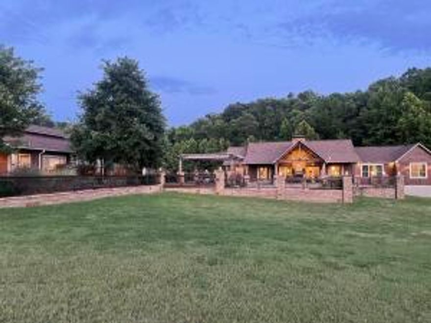 No place like HOME resonates differently when it has all the amenities this beautifully built completely custom estate offers. Main house 5BD 3 BA, 2 LRs, attached pool room w tanning bed. Indoor/outdoor rock fireplace, under one of the many covered patios w/ mister fans, sit and enjoy the breathtaking mountain view, stunning sunsets, laze by the pool, enjoy the deck area w/ pergola covering the 8 person hot tub.  Guests?  Send them next door. 1BD 1BA Apt w/ its own kitchen, LR & DR. If thats not tempting enough, then how about the 9 heated and cooled garage/shops ,1/2 BA, kitchen area, fireplace and hatchet throwing lane.. Then head out to one of the 2 ponds for a little fishing.  Nestled in the Ozarks, national forest, just mins from Big Piney..... Peace & Happiness never looked so good!