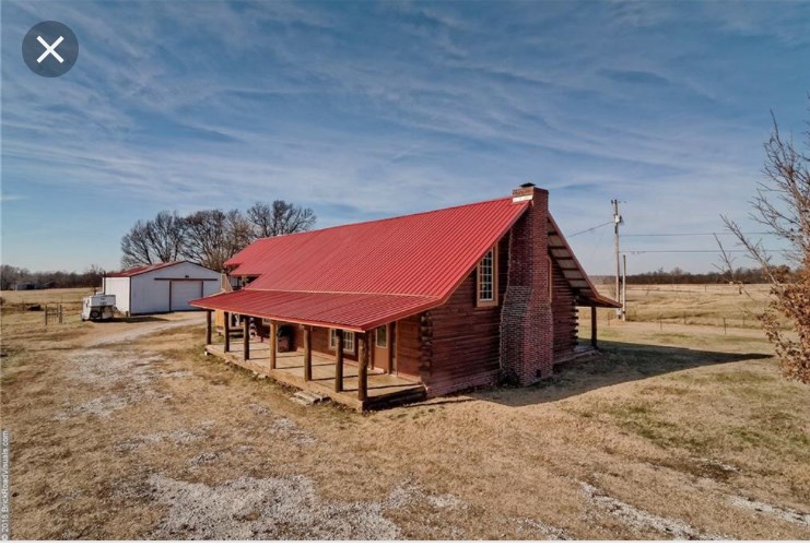 Looking for that perfect log home, look no more. Comes on 3.46 acres, cross fenced with enough property for your horses or other livestock. Three covered porches, a private master bedroom balcony. Great for entertaining friends and families, fire pits included. Huge shop, large enough to run a small business or store all your toys. Just minutes to town but with all the country living amenities.