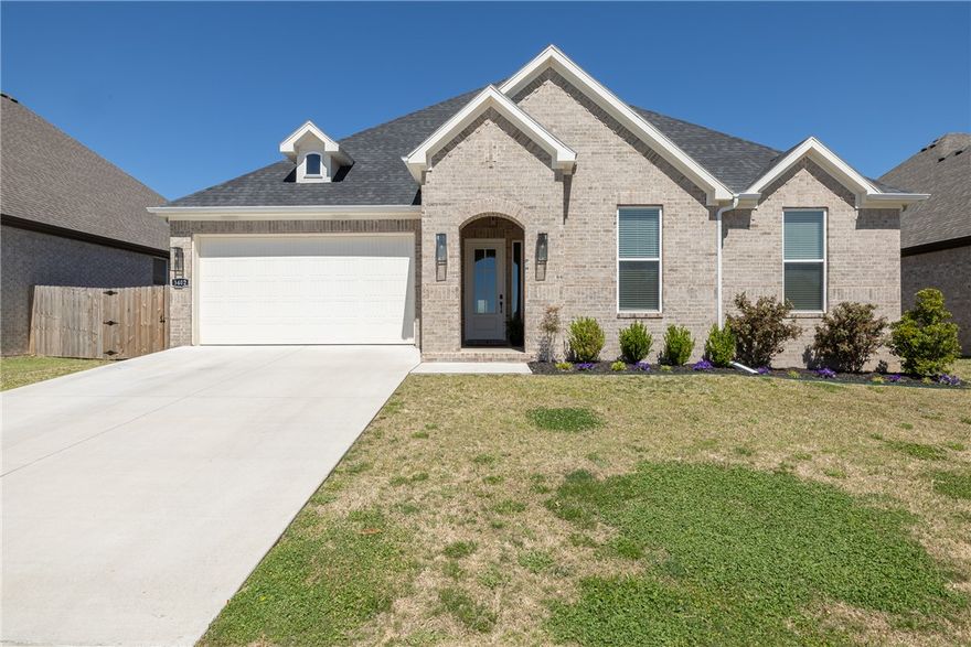 Built in 2024, this beautifully designed single-level home offers 4 bedrooms and 3 bathrooms with a spacious, modern layout. The open floor plan is perfect for everyday living and entertaining, featuring a large kitchen island that anchors the main living space. A dedicated office provides a quiet area for work or study. The spacious primary suite and en-suite bath offers a walk-in shower, soaking tub and walk-in closet. Step outside to a covered back patio that overlooks a serene pond, creating a peaceful setting for relaxing or hosting guests. The backyard also includes a private putting green, adding a fun and unique touch for golf enthusiasts. This home blends comfort, style, and functionality in a thoughtfully designed space. Fantastic location close to Lake Fayetteville, trails and the Botanical Gardens.