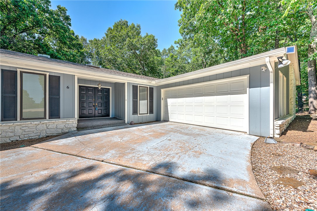 Impeccably maintained and nearly 3,000 SF, this 4-bedroom Bella Vista gem is a great value that offers comfort, potential, and outdoor adventureājust a 1-minute ride to the Back 40 trailhead and miles of world-class biking trails. Two living areas, a finished walk-out basement with game room, greenhouse, and expansive screened-in porches provide flexible space for relaxing, entertaining, and enjoying wooded views. The spacious Primary Suite on the main level, includes private deck accessāperfect for morning coffee or a peaceful nightcap. Updates include a newer roof, HVAC, and fresh exterior paint. Move-in ready with solid construction and generous storage, the home invites your personal touches and modern updates to unlock its full potential. Nestled steps from Lake Ann, walking trails, golf courses, community pools and pickleball courts, and just minutes from I-49 and vibrant downtown Bentonville, itās your gateway to all Northwest Arkansas has to offer. INCLUDES A $2000 BUYER CREDIT TOWARD A HOME WARRANTY!