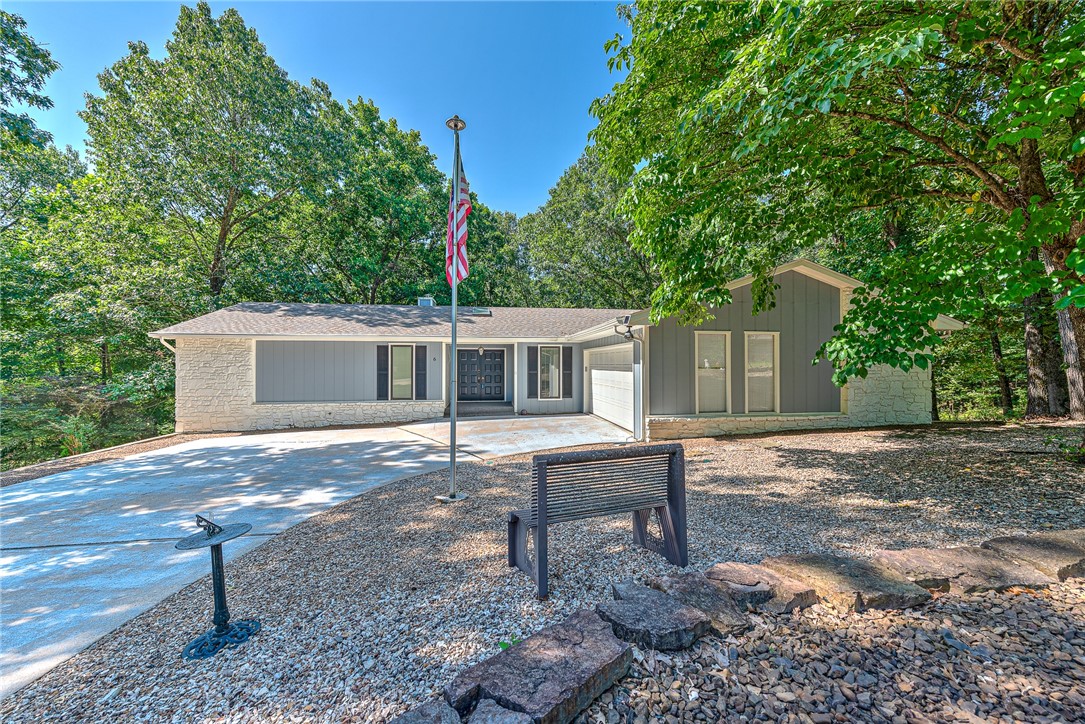 Impeccably maintained and nearly 3,000 SF, this 4-bedroom Bella Vista gem is a great value that offers comfort, potential, and outdoor adventureājust a 1-minute ride to the Back 40 trailhead and miles of world-class biking trails. Two living areas, a finished walk-out basement with game room, greenhouse, and expansive screened-in porches provide flexible space for relaxing, entertaining, and enjoying wooded views. The spacious Primary Suite on the main level, includes private deck accessāperfect for morning coffee or a peaceful nightcap. Updates include a newer roof, HVAC, and fresh exterior paint. Move-in ready with solid construction and generous storage, the home invites your personal touches and modern updates to unlock its full potential. Nestled steps from Lake Ann, walking trails, golf courses, community pools and pickleball courts, and just minutes from I-49 and vibrant downtown Bentonville, itās your gateway to all Northwest Arkansas has to offer. INCLUDES A $2000 BUYER CREDIT TOWARD A HOME WARRANTY!