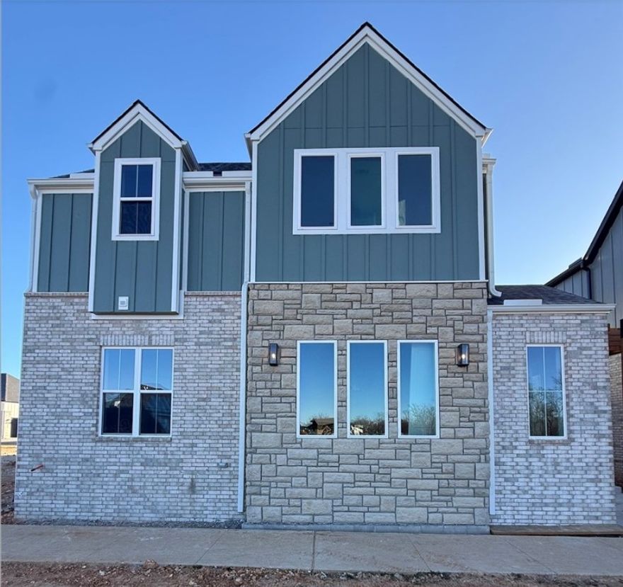 Charming garden home in the Aurora subdivision offering easy, low-maintenance living. This thoughtfully designed 3-bedroom home features GE Café appliances, a functional open-concept layout, and quality finishes throughout. The single-floor living plan provides comfortable everyday living with efficient use of space and easy accessibility, ideal for buyers seeking a garden home lifestyle with low maintenance and a clean, modern design.