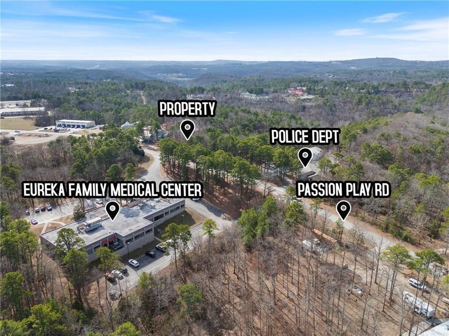 Check out this centrally located 0.82-acre property with easy access to downtown Eureka Springs and Highway 62. Offering both commercial and residential potential, this versatile lot provides a great opportunity for development or personal use.

Conveniently located near the Medical Clinic, Police Station, shopping centers, campgrounds, and other local businesses, the property offers excellent accessibility and visibility. It is also just minutes from The Great Passion Play and nearby mountain biking trails that continue to attract visitors and outdoor enthusiasts to the area.

All utilities are available, making the property ready for a variety of possible uses including commercial development, residential construction, or mixed-use plans. Whether you are looking to build a business or develop a home, this property offers flexibility in a desirable Eureka Springs location.