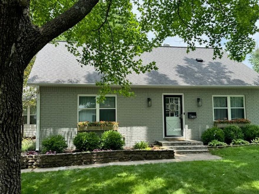 Welcome home to this charming 4-bedroom, 2.5-bath which home offers unbeatable walkability to the Square, Crystal Bridges, Orchards Park, the Momentary, and top-rated schools—with easy access to I-49 and local trails. Nestled on a shady lot with mature trees, window boxes and a backyard shed, this two-story home combines architect-designed modern updates with classic comfort. Inside, the open floor plan centers around a custom kitchen featuring quartz countertops, double wall ovens, a gas range with hood, and island seating. The main level includes a formal dining room, breakfast nook, home office/guest room, and a quiet front sitting room ideal for a music room or library. The spacious primary suite was fully remodeled in 2017 with a sleek modern bathroom and walk-in shower. A thoughtfully designed mudroom with custom pegboard storage adds everyday functionality. Additional updates include a mini split (2024) and brand-new carpet (2025). A rare find with style, space, and location all in one.