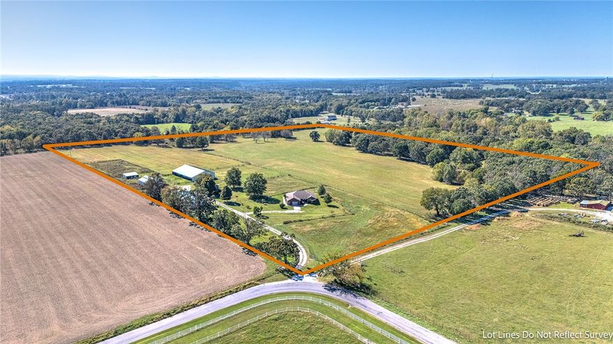 Discover endless possibilities on this stunning 39.64 acre property featuring a beautiful 2,169 Sq.ft. home with 4 Bedrooms/2 Baths, rich wood floors, split floor plan, wood burning fireplace, elegant crown molding, & custom hickory cabinets.  The property also includes, a large commercial grade shop building with an office/living space and a full bath perfect for business, guest quarters, or creative workspace.  The property also has a 6 stall Horse barn, and a large Hay barn  and everything is connected to Highfill water making this a versatile property offering exceptional development potential-create a housing community, continue as a serene ranch, or transform it into a unique event venue.  Just minutes from XNA airport yet surrounded by open skies and minimal light pollution, this land offers privacy, beauty, and opportunity all in one. A preapproval letter must be presented for showings and for offers.