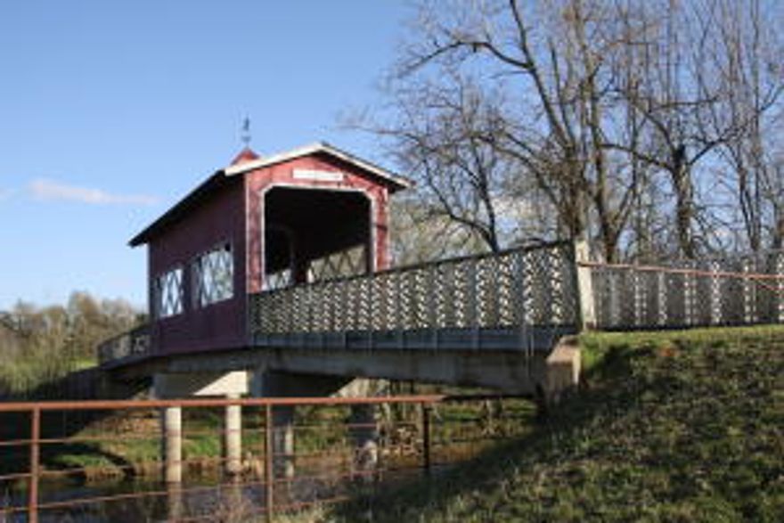 Great 130 acre parcel of land fronting on Hwy 7 S. Barn, Corrals, Water & Bridge over Crooked Creek. Great home site.