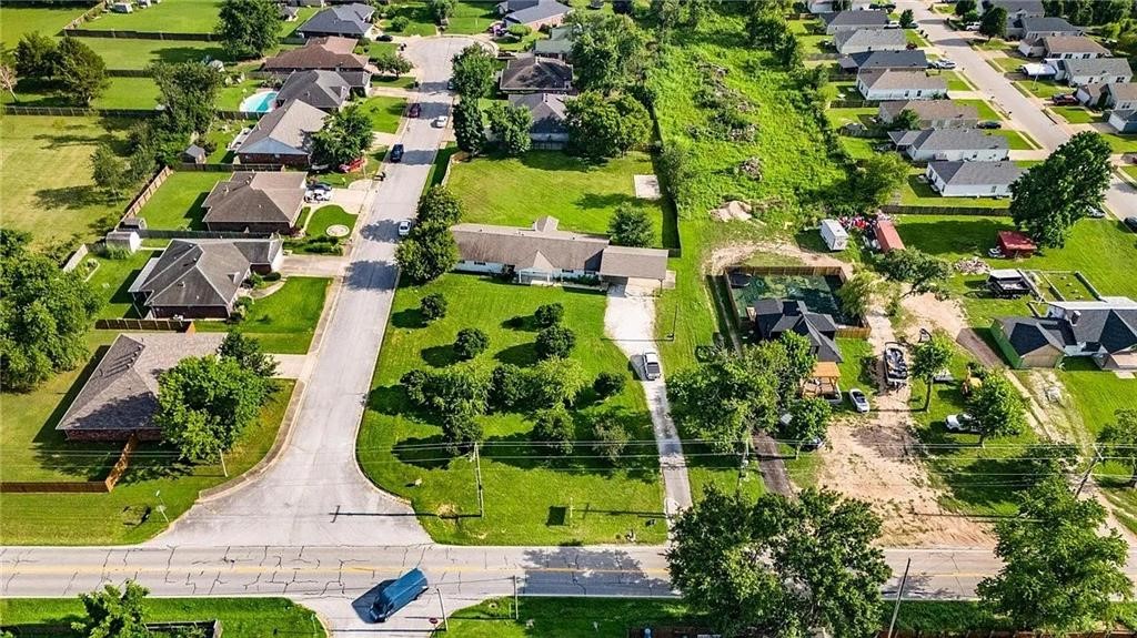 This 1.28-acre property offers an excellent opportunity for investors and entrepreneurs. Located on a prime lot, the site could be zoned for a variety of uses and has vast potential for future commercial or mixed-use development. The existing home has gone through a full renovation. Seller financing available!