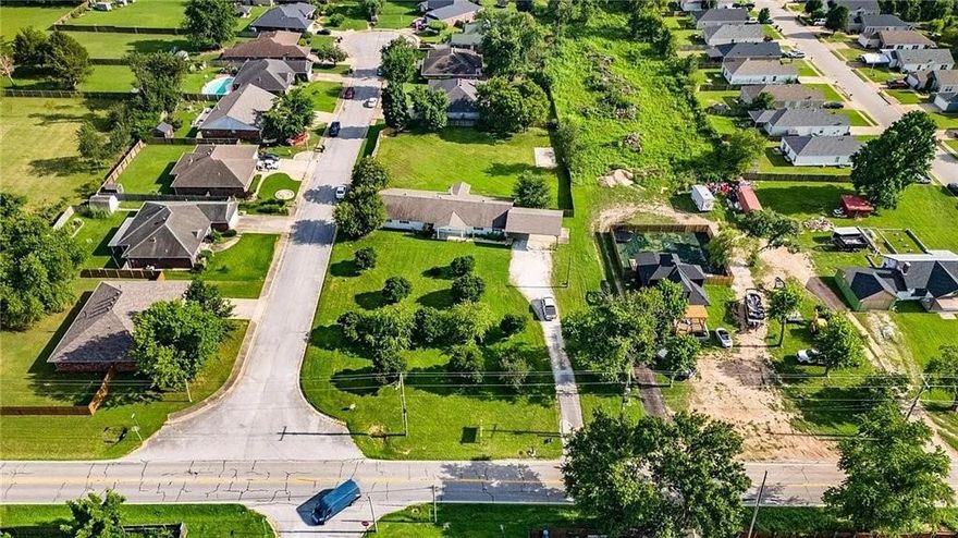 This 1.28-acre property offers an excellent opportunity for investors and entrepreneurs. Located on a prime lot, the site could be zoned for a variety of uses and has vast potential for future commercial or mixed-use development. The existing home has gone through a full renovation. Seller financing available!