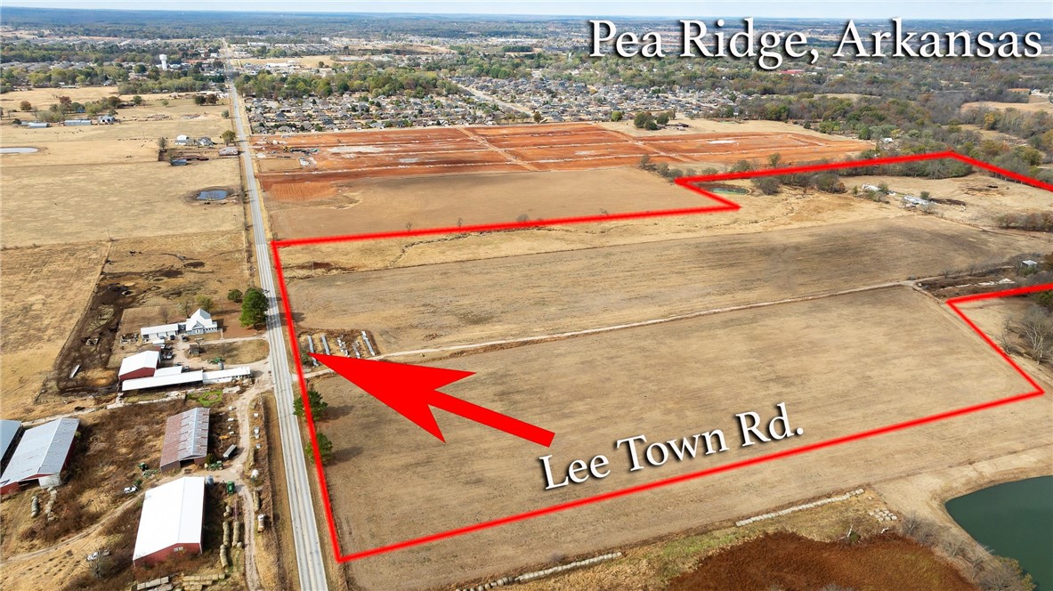 Amazing Development potential. Located just 1 mile from the center of the rapidly growing Pea Ridge and adjacent to land currently being developed by DR Horton. 67.78 acres with over 1000 feet of Lee Town Road frontage. Mostly level and cleared for easy development with trees and sloped land to the north of Shrader Rd. Currently just outside of Pea Ridge city limits. Water and Sewer coming soon to the adjacent DR Horten development.