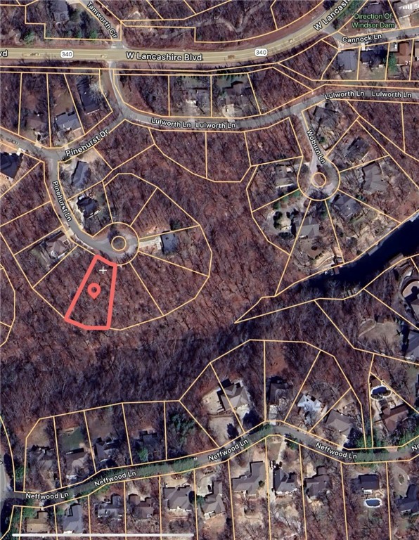 Build your dream home on this beautiful 0.40-acre lot in the heart of Bella Vista! Enjoy the convenience of being just minutes from the scenic Tanyard Creek Trails & waterfall, Windsor Lake, and the premier Bella Vista Country Club and golf course. Whether you're an outdoor enthusiast or simply looking for a peaceful place to call home, this location offers the perfect blend of nature, recreation, and community living.