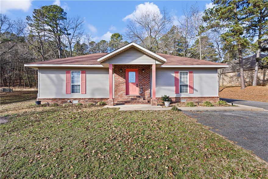 Charming single level home offering 3 bedrooms and 2 full baths with a practical layout and comfortable living space. Situated on a large lot in a highly convenient Russellville location near Sequoyah Elementary and close to the hospital. This property combines everyday convenience with a desirable area known for strong surrounding home values. A great opportunity for buyers seeking space, location, and easy single-story living!