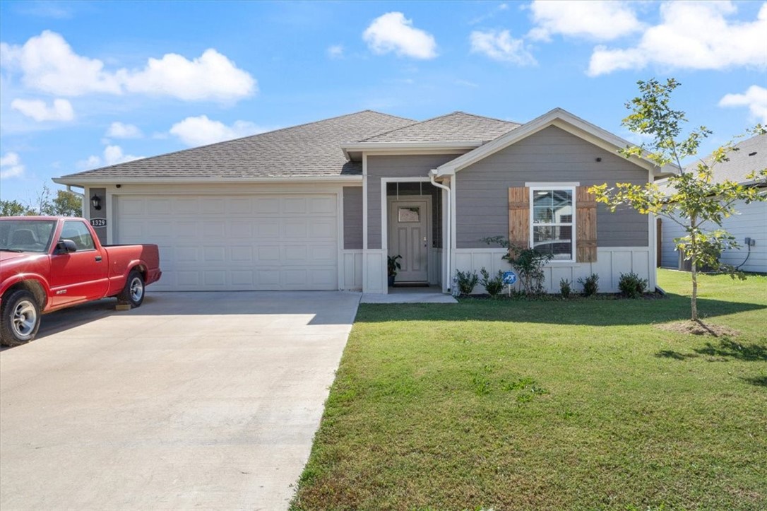 Like new- Built in 2023, this home offers over 2,000 sq. ft. of thoughtfully designed living space- making it one of the larger homes in the neighborhood. With 4 bedrooms, 3 full baths, and a flex/office room, this floor plan provides exceptional comfort and versatility. The open-concept design features a bright kitchen with quartz countertops, stainless steel appliances, a large island, and a walk-in pantry, perfect for entertaining or everyday living. Enjoy durable Luxury Vinyl Plank flooring throughout, energy-efficient details, and LP Smart Siding for low-maintenance appeal. Outside, a covered patio overlooks the privacy-fenced yard on a corner lot, complete with landscaping and a two-car garage. Located in Main Street Village, this home is close to Gentry schools, parks, shops, and dining, with easy access to Highway 12 and 59 for quick commutes to Siloam Springs and Bentonville.