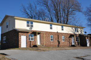 Nice 4 unit apartment building, 2 units upstairs, 2 units downstairs, 2BR, 1BA, gas heat, window AC, brick & vinyl exterior, metal roof, lots of remodeling done in the last few years, washer & dryer hookups in each unit.