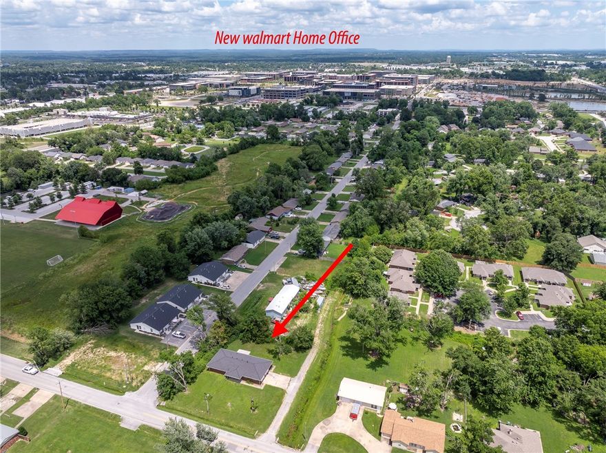 Development Opportunity!
New land use plan is Urban Neighborhood (highest intensity neighborhoods) and recently rezoned DN-4 (2025) allowing multi-family housing and mixed use structures. Close proximity to the Momentary, 8th St Market, Thaden School and down the street from Walmart's Corporate Campus. The value is in the land.  This property also listed as Residential - see MLS#1312563 and Land - see MLS#1312663.  Property sold "as is."  Do Not Disturb - Tenant Occupied