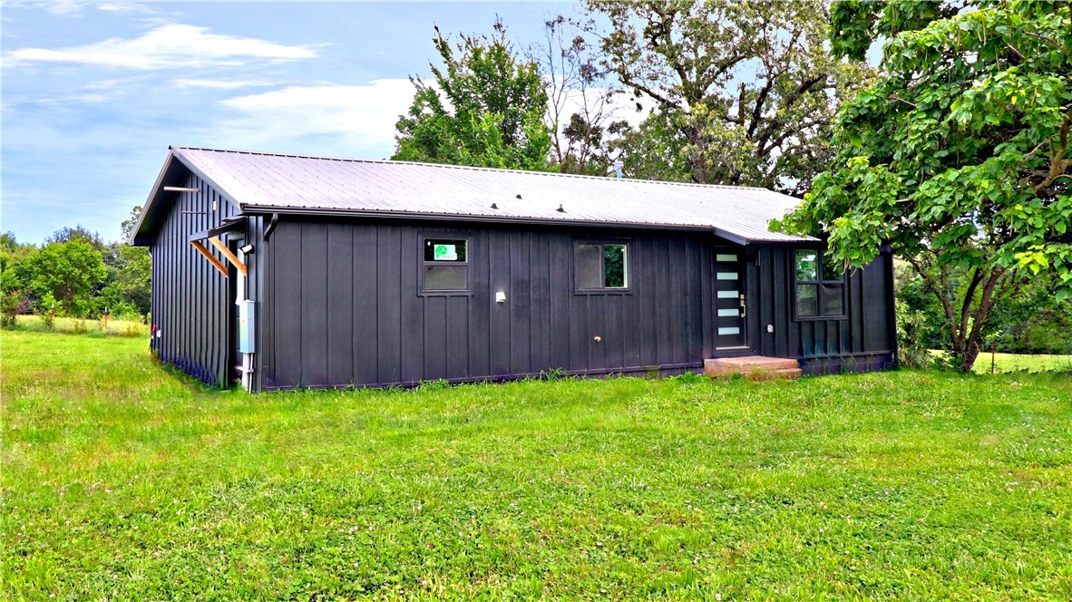 Fully remodeled 1248 sq ft home on 14.87 acres on paved road. Outstanding property to live in the country- just minutes from shopping and entertainment districts. Remodeled 3 bedrooms and 2 full baths. New sheetrock, paint, flooring, trim, doors and windows. New Kitchen cabinets and counters. New appliances. New Water Heater Rolling hills and open grass areas. Wonderful views and open spaces for building your dream home or family estate. Public gas and Electric available. Home remodel in progress to be completed August 2025