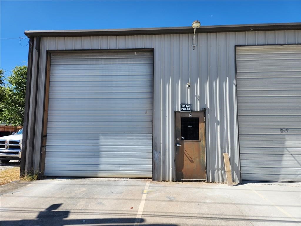 Ideal commercial warehouse space with overhead bay door in prime Industrial Park close to Springdale Municipal Airport! This expansive 1,150 sq.ft. gem is now available for lease. Featuring one large overhead bay door WITH ELECTRIC OPENER, this warehouse unit offers easy access for business operations. The high ceilings allow for vertical utilization of space, maximizing storage capacity, while the open floor plan allows for efficient layout design, ensuring optimal workflow. Gas heater allows tenant to maintain a comfortable temperature year-round. (Tenant is responsible for utilities.) Built-in bathroom ensures convenient comfort. Lease opportunity requires a minimum 1-year commitment, providing stability and long-term planning for tenant's business. Don't miss out on this prime location that offers ample space and versatility to suit a variety of commercial needs while providing visibility and easy access for clients, suppliers, and employees alike. Contact us to schedule & coordinate a tour!