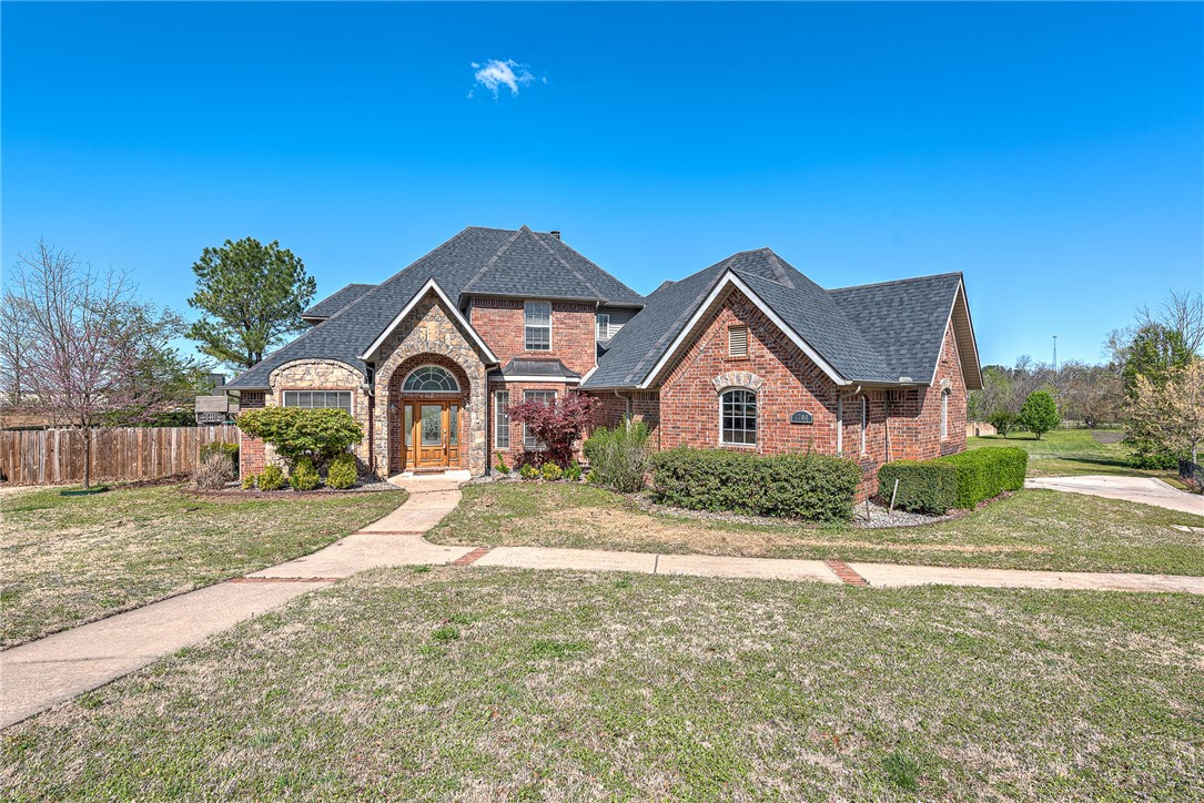 Nestled in a PRIME location across from the new Whole Foods and adjacent to the Promenade area, this exquisite 2-level brick home on two parcels offers unbeatable convenience to shopping, dining, entertainment and the Razorback Greenway. The location just can’t be beat with direct, personal access from the backyard to the NWA trail system. Set on just over an acre, the home boasts 5 spacious bedrooms, an office/study, and elegant granite countertops throughout. Enjoy multiple living spaces, both inside and out. Inviting decks and patios, featuring an above-ground pool and hot tub (which both convey) beckon you to relax in your own private oasis. Additional features include generous walk-in closets, fireplaces in both the living area AND the study, and a LARGE crawlspace with plenty of storage. New roof in August of 2021. Don’t miss this exceptional opportunity!