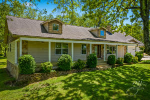 Live the country life on this 8.37 acres m/l hobby farm! Nestled on this beautiful property is a 3 BR, 2 BA home with an open floor plan featuring a full length porch with panoramic views. It offers Wellborn cabinets in the kitchen and office, large island with sink and pot rack, 8' pantry with roll outs, Frigidaire gallery gas range, water softener, and a native stone wood-burning fireplace ducted into the HVAC system. New HVAC in 2020. Also included are a large pole barn with electric and RV parking, 2 RV hookups (1 full and 1 elec), 30 AMP RV outlet, above ground pool 2019, chicken coop, greenhouse, potting shed, garden area, fruit trees, 500 gallon propane tank, Guardian whole house 20Kw generator and so much more! No restrictions. Call today for a showing appointment!
