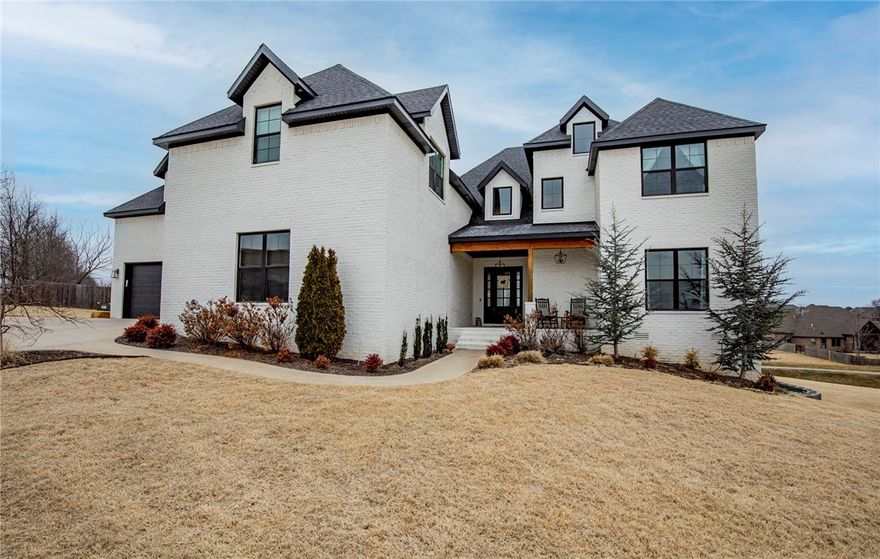 This stunning, custom built home is a must see. Open floor plan with beams in living room and coffered ceiling in kitchen. Behind beautiful white cabinets is a huge walk-in pantry with electrical outlets.Large windows throughout. Master is oversized with barn door opening into a dream master bath with oversized shower and beautiful soaker tub. Each spare bedroom has a secret hiding/ study nook. On other side of the home upstairs is a double bonus room with a full bath. Perfect for homeschool, crafts, games, theater, and/or game room. On side of home is a 4th mini garage for lawn mower and workshop with lights and electrical.